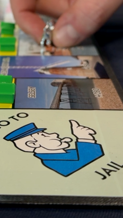 A close-up of a Monopoly board