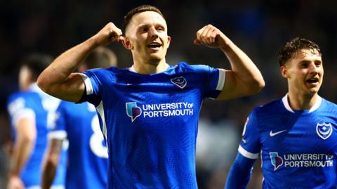 Colby Bishop celebrates after scoring for Portsmouth