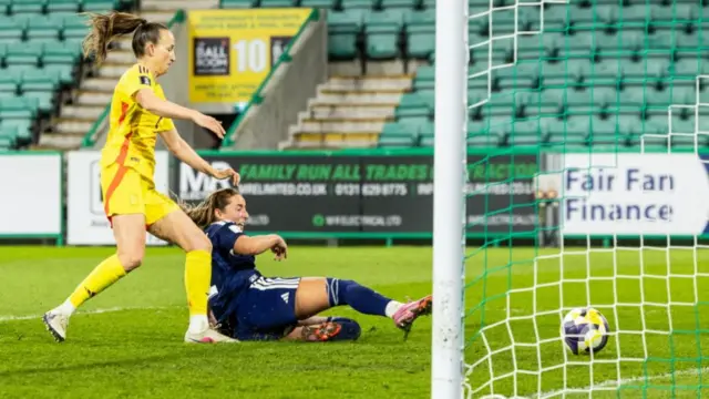 Scotland's Kathleen McGovern scores to make it 1-1