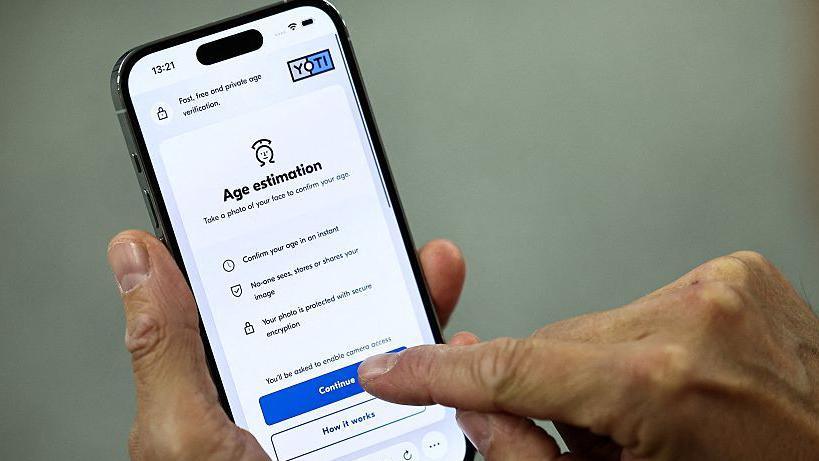 Age verification site shown on a smartphone