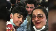 Бурхон ва унинг оиласи RAF учоғида ватанларини тарк этишмоқда