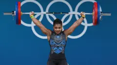 Olimpijske igre, dizačica tegova