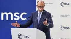 Umutegetsi mukuru w'Ubudage Friedrich Merz arimo kuvuga ijambo mu nama mpuzamahanga ya 62 yiga ku mutekano yitwa 'Munich Security Conference', ibera i Munich mu Budage. Ifoto yo ku itariki ya 13 Gashyantare (2) mu mwaka wa 2026. 