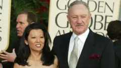 Gene Hackman & wife Betsy Arakawa during The 60th Annual Golden Globe Awards - Arrivals at The Beverly Hilton Hotel in Beverly Hills, California, United States