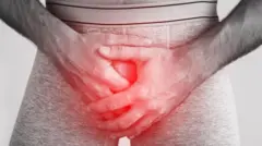 ብልቱን የያዘ ግለሰብ