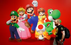 A visitor walks by "Super Mario" video-game poster from the Super Mario video game series created by Nintendo during the 'Paris Games Week' at Parc des Expositions Porte de Versailles on October 23, 2024 in Paris