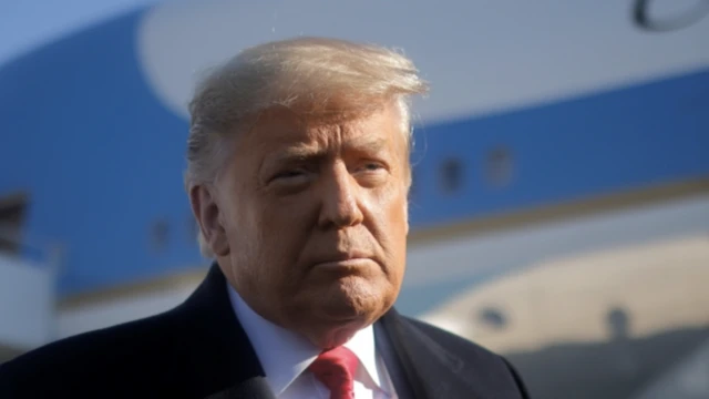 Donald Trump boards Air Force One to travel to Texas, 12 January