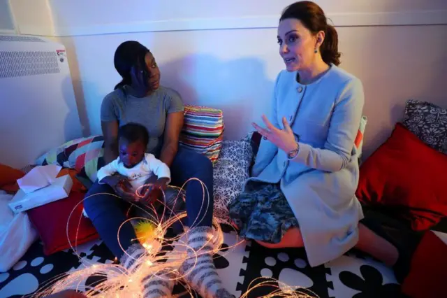 One mother sidon for floor wit her baby for one sensory room at a mother and baby unit