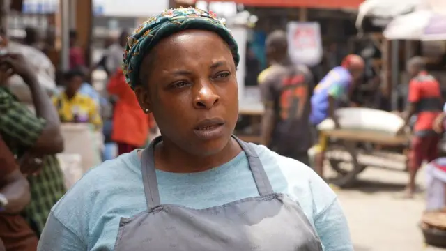 Woman for market lament high cost of food items