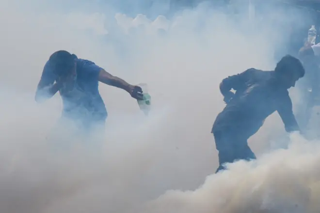 Ongoing anti-government protests against Sri Lanka's President Gotabaya Rajapaksa were met with water cannons and tear gas today on May 6, 2022 Protesters in front of Sri Lanka's parliament were met with force thrice today. (Photo by Akila Jayawardana/NurPhoto via Getty Images)
