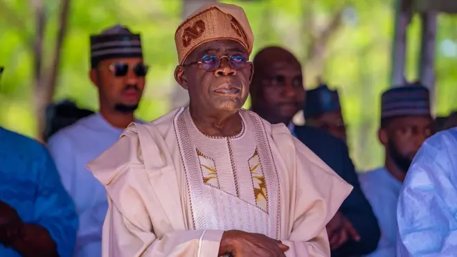 Nigeria President Bola TInubu attend Eid morning prayers.