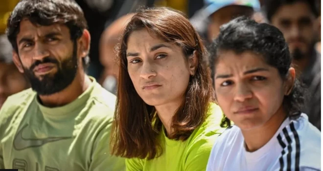 बजरंग पुनिया, विनेश फोगाट आणि साक्षी मलिक 