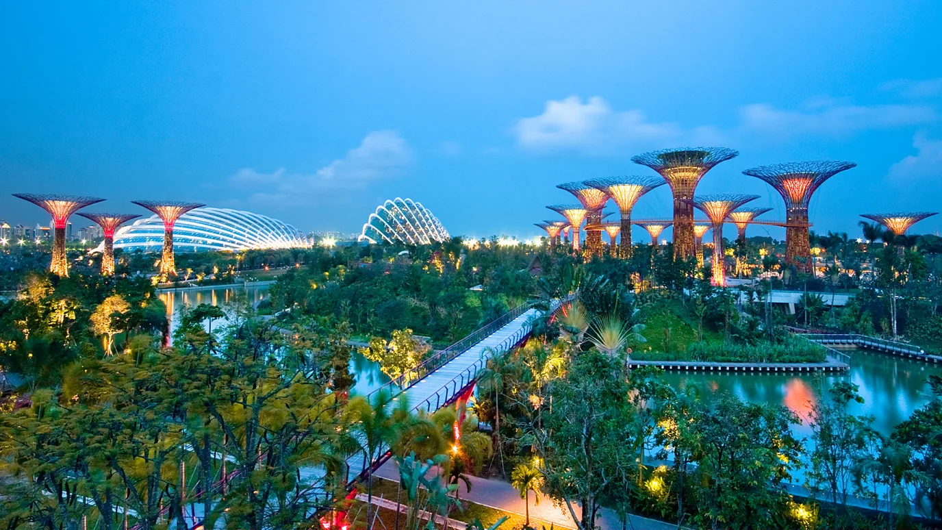 Rear view of a man in a red jacket looking at the Svinafellsjokull Glacier in Iceland (Credit: Getty Images)