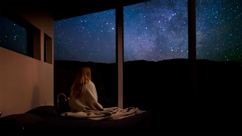 Woman looking up at stars at Bliss & Stars retreat (Credit: Teagan Cunniffe)