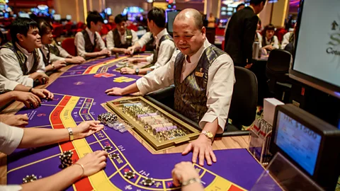 Philippe Lopez/Getty Gambling revenue fuels Macau's quality of life (Credit: Philippe Lopez/Getty)