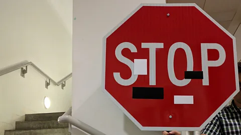 Kevin Eykholt et al A few simple stickers on a 'stop' sign are enough to render it invisible to a machine vision algorithm while to human eyes it is still obvious (Credit: Kevin Eykholt et al)