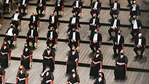 Andrea Pattaro/AFP/Getty Images The long-term effects of Covid-19 on singers has still to be fully understood, but has led to changes in the short-term (Credit: Andrea Pattaro/AFP/Getty Images)