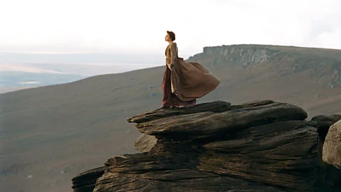 Alamy Keira Knightley on a cliff edge in Derbyshire, UK, from 2005's Pride and Prejudice (Credit: Alamy)
