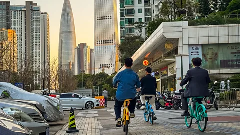 Getty Images Shenzhen's soaring skyscrapers and bike-sharing schemes reflect the city's rapid growth and expat appeal (Credit: Getty Images)