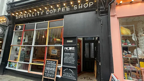 Debbie Ward In recent years, independent cafes and shops have helped revitalise America Ground (Credit: Debbie Ward)