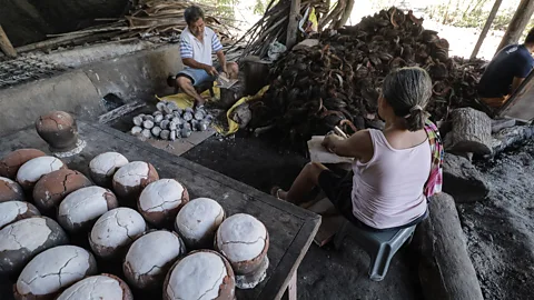 Gerald Marcfred Dillera / Unesco The process of making asin tibuok has remained relatively unchanged for centuries (Credit: Gerald Marcfred Dillera / Unesco)