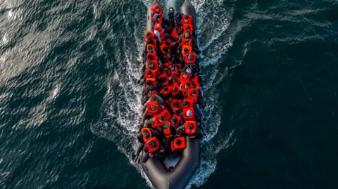 A group of migrants are on board a rigid inflatable in the Channel.