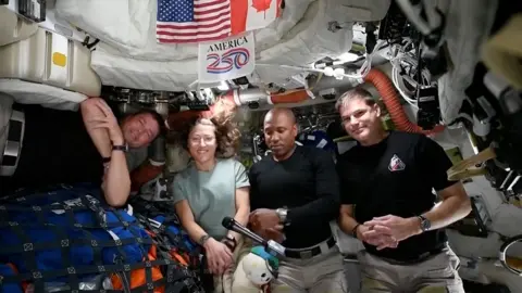 Artemis II crew in Orion capsule