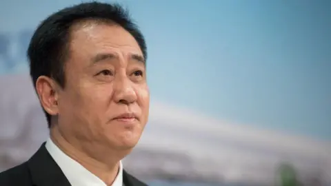 Hui Ka Yan, chairman of China Evergrande Group, pauses during a news conference in Hong Kong, China, on Tuesday, March 26, 2019. 