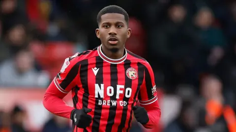Daniel Kanu in action for Walsall 