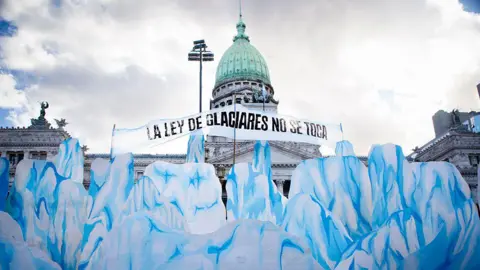 Large cardboard cut-outs of glaciers in front of Argentina's national congress