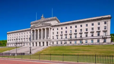 Stormont buildings on a sunny day. The building is cream stone.
